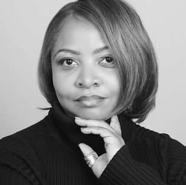 Black and white headshot image of voiceover artist, Rosland Martin.