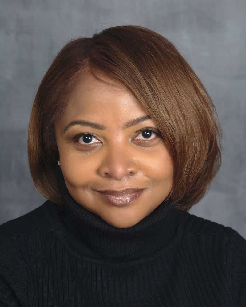 Color headshot image of voice over artist, Rosland Martin.
