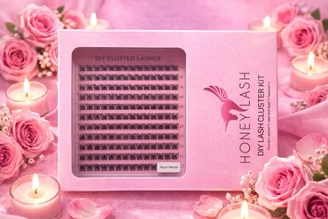 HoneyLash DIY Lash Cluster Kit surrounded by pink roses and candles.