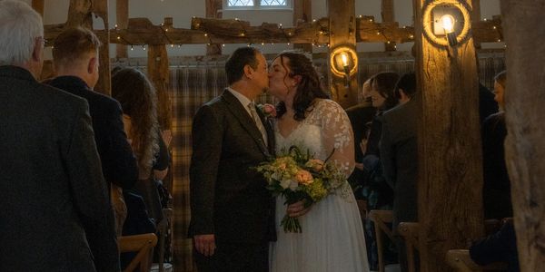 Wedding Photography: Ceremony couple kissing