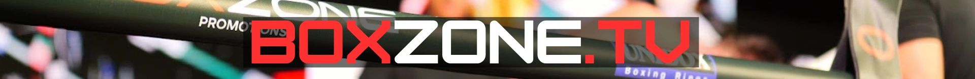 Close-up of a boxing ring rope with 'BOXZONE.TV' branding in red and white letters.