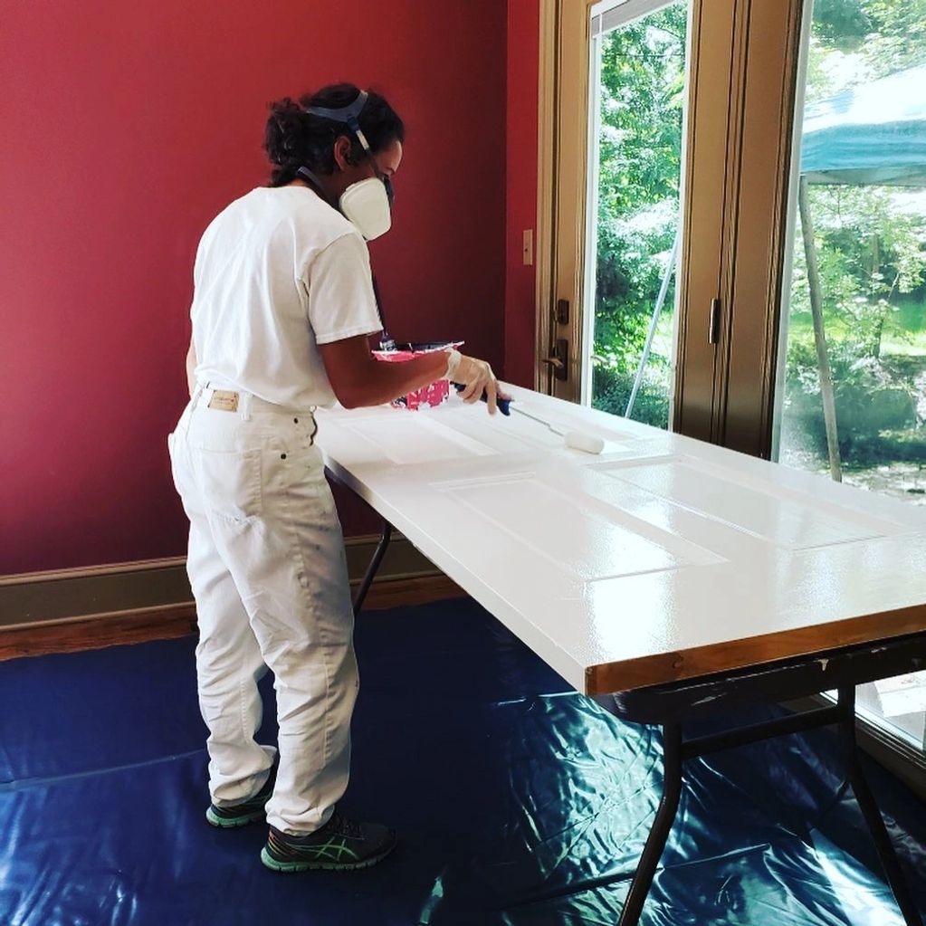 Repainting solid wooden doors with oil based enamel 