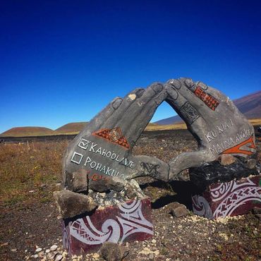 In Hula dance, hands shaping a mountain represent "Protect Mauna Kea" the sacred mountain.  NO TMT