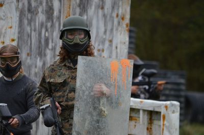 Paintball player with paintball riot shield