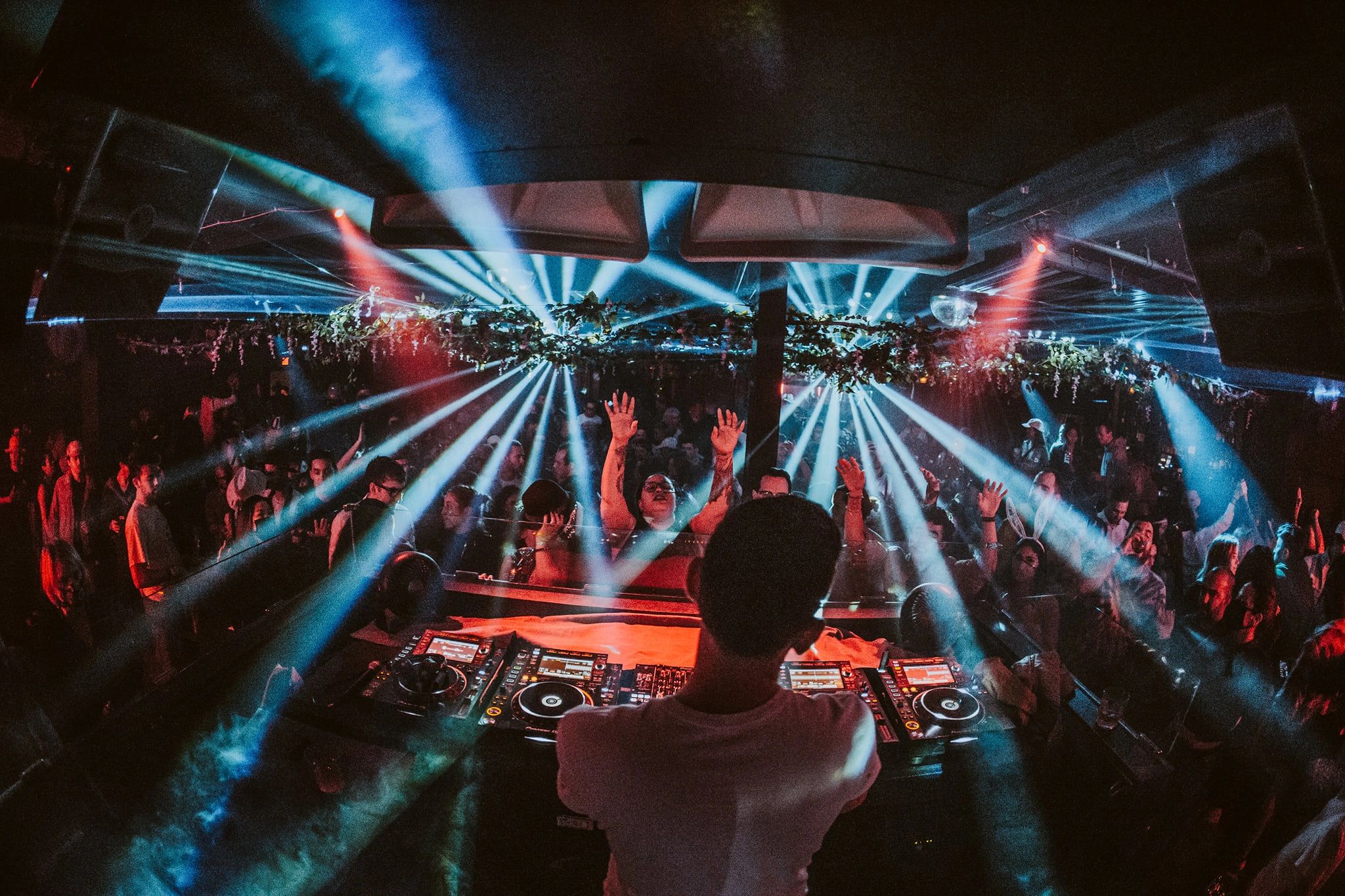 Rear view of DJ Sasheen performing live at Audio Nightclub in San Francisco