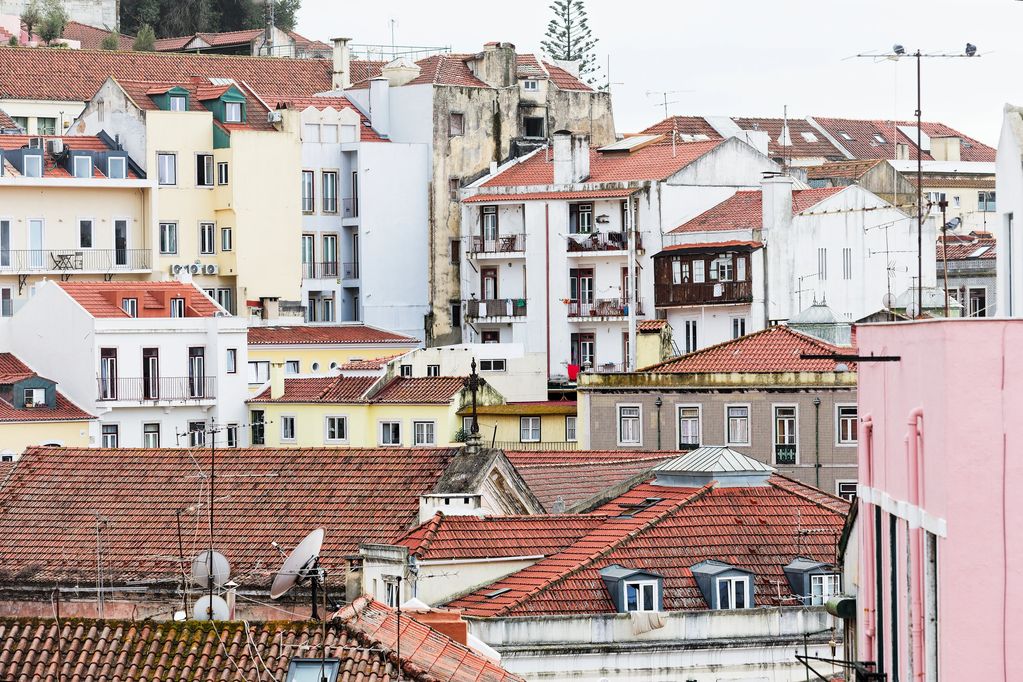 Old Lisbon, Portugal. Apartments built most often without elevators. Wash is hung out to dry, amid s