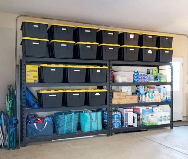 Organized Garage by The Garage Ninja using a Garage Shelf and Garage individual plastic boxes.