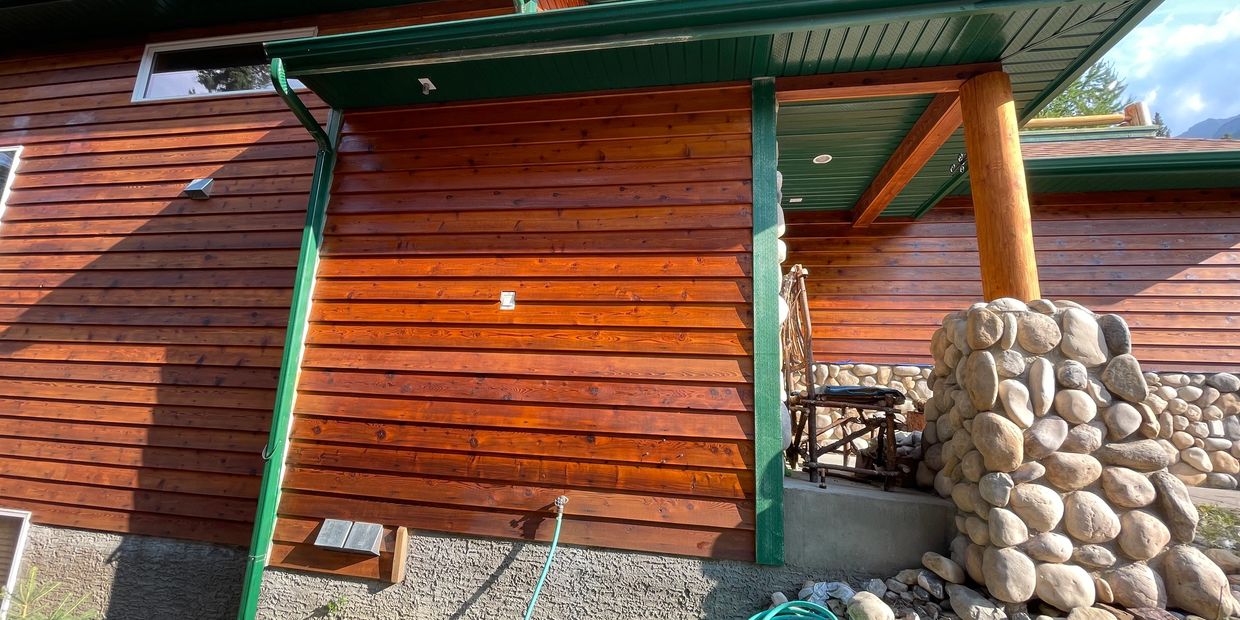 Rustic wooden house after our wood restoration has been done.