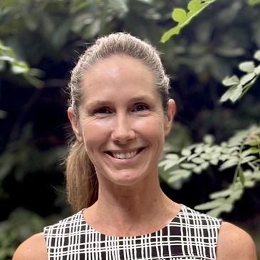 Picture of Kate O'fathartaigh, looking into the camera and smiling. 