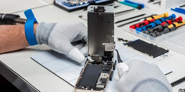 Repairing a smartphone screen.