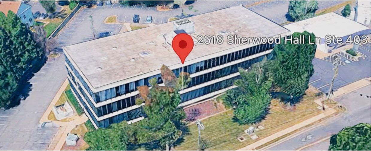 Aerial view of an office building at 2616 Sherwood Hall Ln.