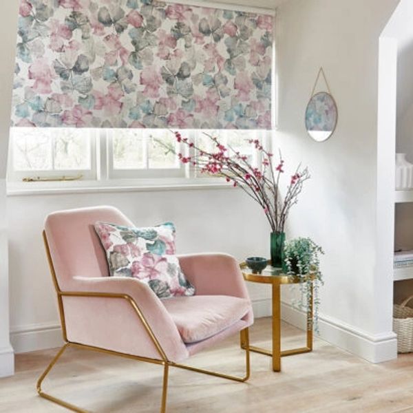 pastel pink and blue roller blind in a floral design
