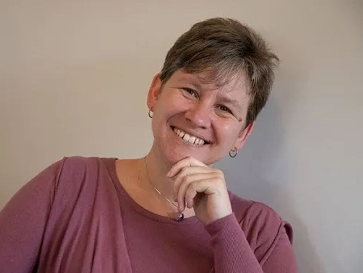 Photo of Paula Bailey smiling. Counselling for families with transgender relatives