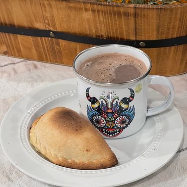 bolivian hot chocolate
hot cacao
100% cacao
cheese empanada 