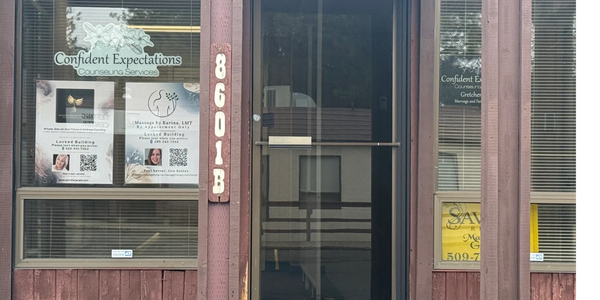 Entrance of the building location with. multiple businesses.