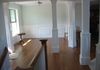 Home of Roy and Lois Jorgenson : Dining room detail, featuring wainscot paneling & interior wood columns