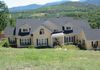 Home of Dr. Steve and Lisa Burt : 1500 sq. ft addition featuring African mahogany doors, heated tile floors, & a temperature controlled storage room