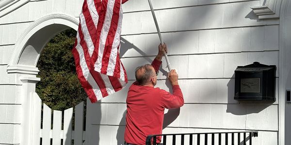 Placing the US Flag as the final touch