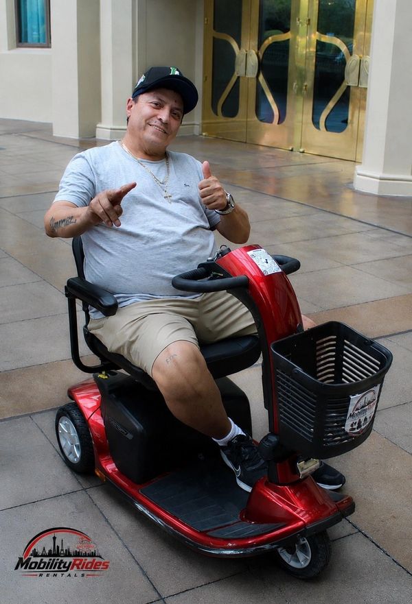 Electric Rides rented by happy handicapped customer