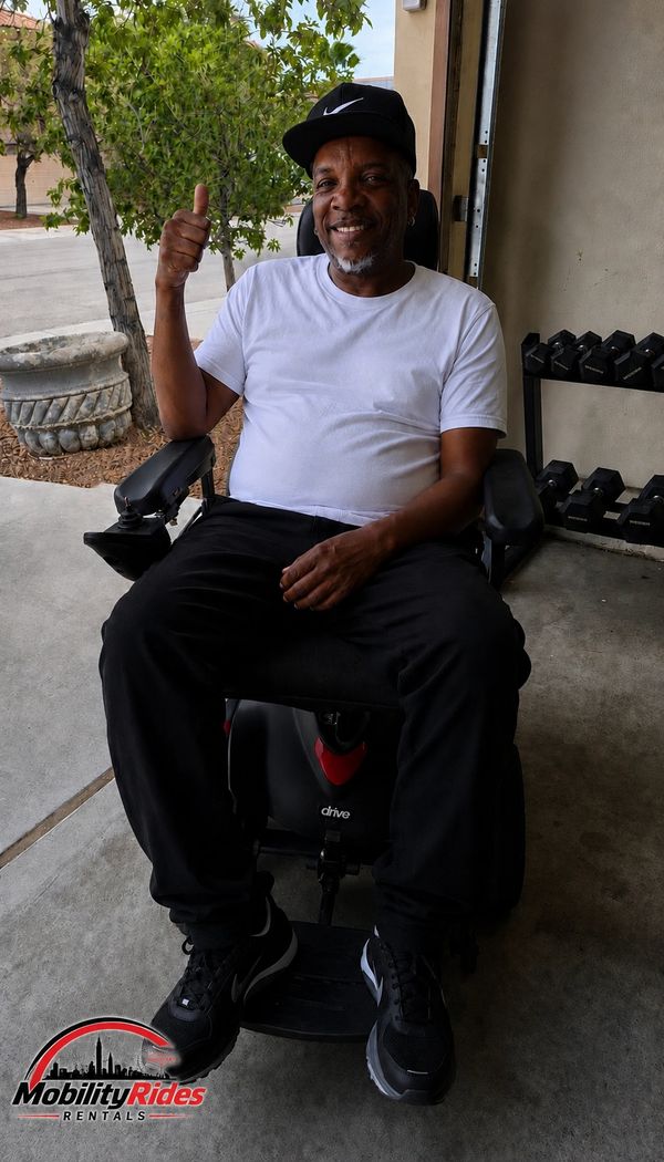 Happy customer with his mobility powerchair in downtown las vegas.