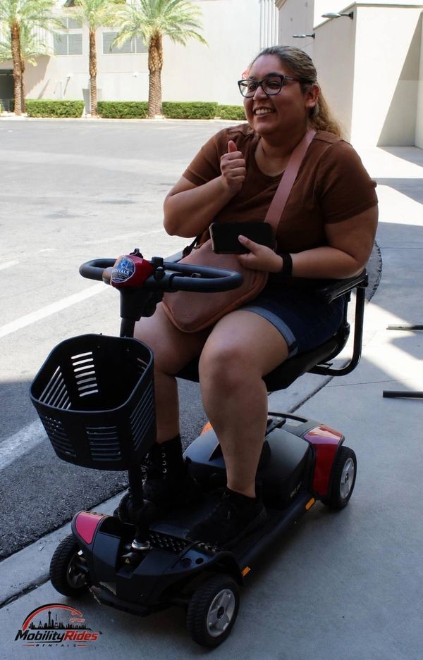 Smiling girl with her rental in las vegas 