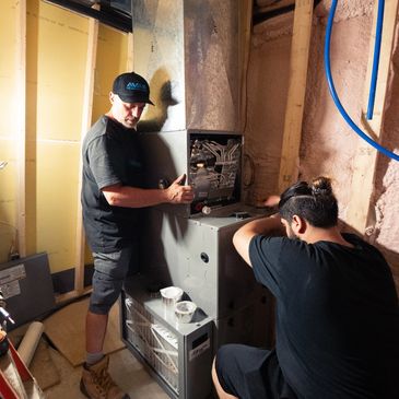 Avas Heating and Air team working