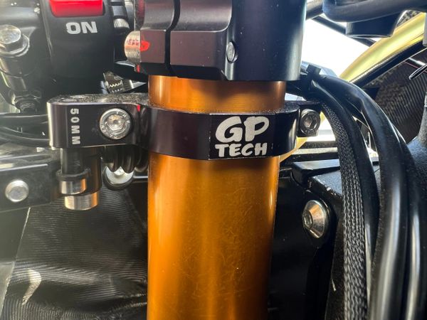 A 50mm GP Tech Fork Mounted Thumb Brake mounted on the fork tube of a 2018 Yamaha R6