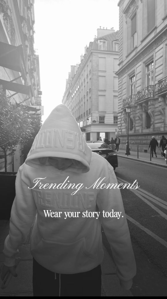 Person wearing hoodie in city street with text overlay.