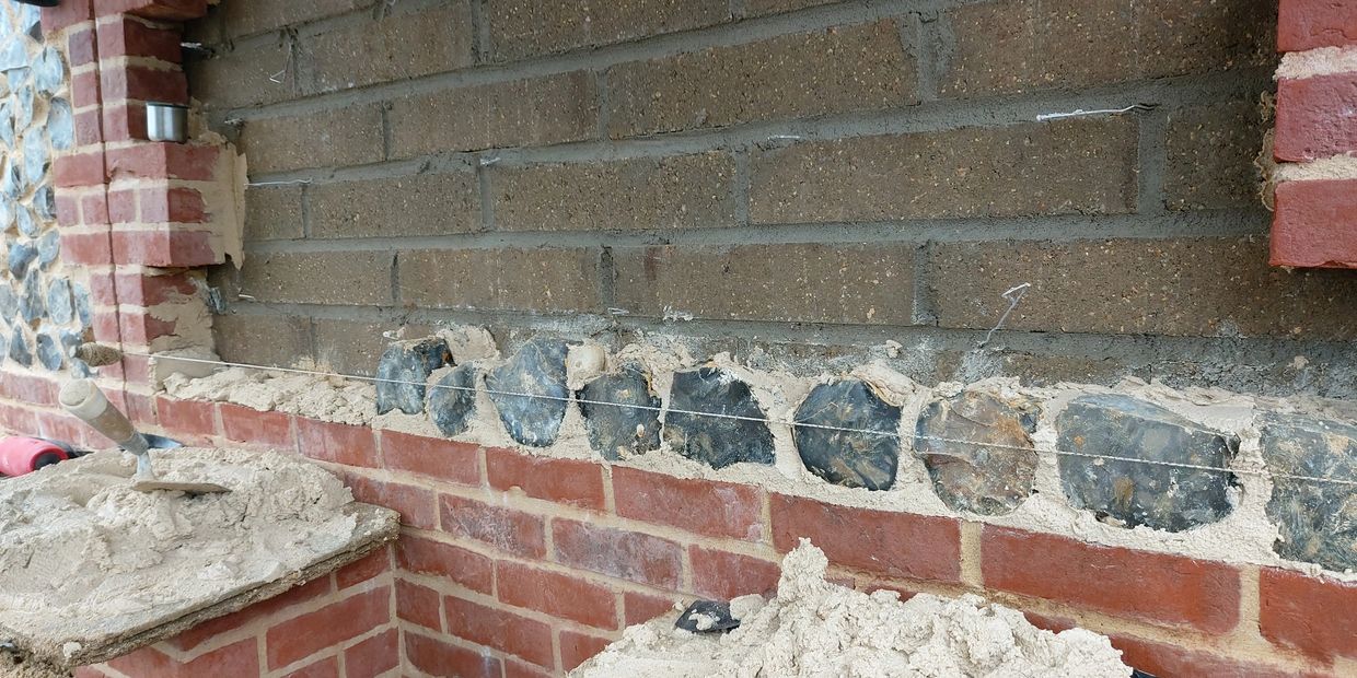 masonry wall build by bricklayer