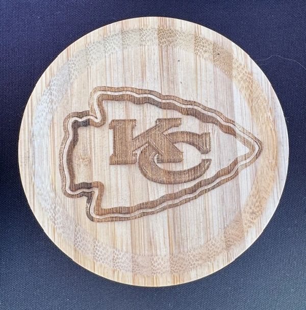 Wooden coaster with the Kansas City Chiefs logo engraved.