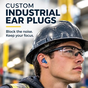Worker wearing custom industrial ear plugs for noise blocking.