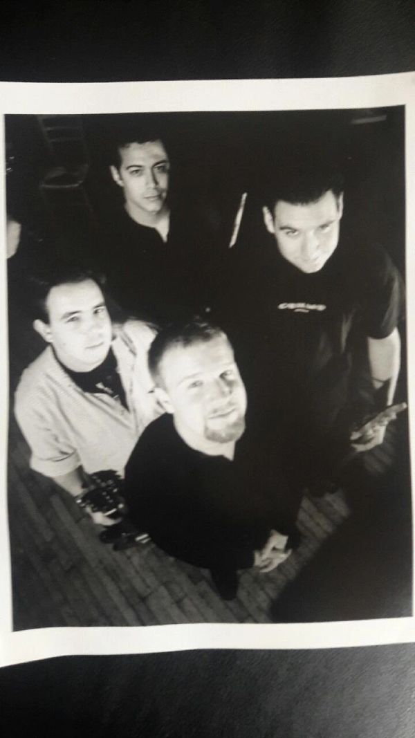 Derek Samuel Reese with the band Stoned Soul promo shot 1990's