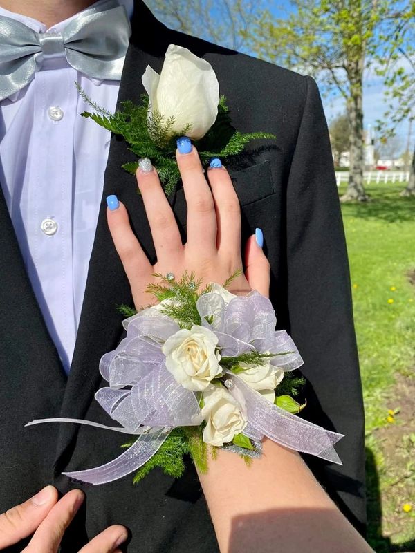 corsage and boutonniere in white