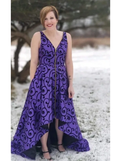 Amy R. Lake of seamstress and designer posing in the snow in one of her designs