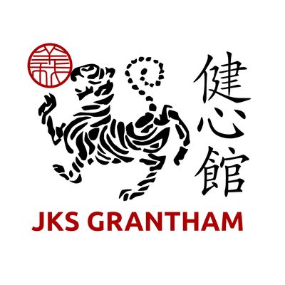 Logo of JKS Grantham with a stylized tiger and Japanese characters.