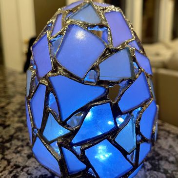 glass art in the shape of an egg