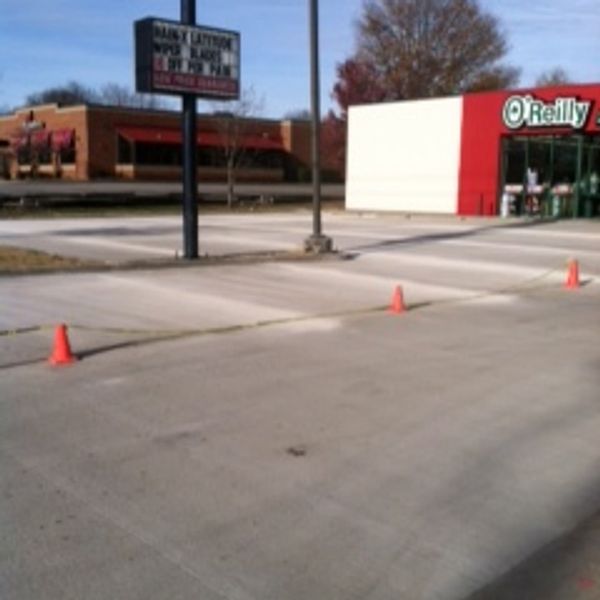 commercial concrete parking lot at O'Reilly's Auto Parts Store