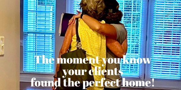Two women embrace in a bright room celebrating a perfect home.