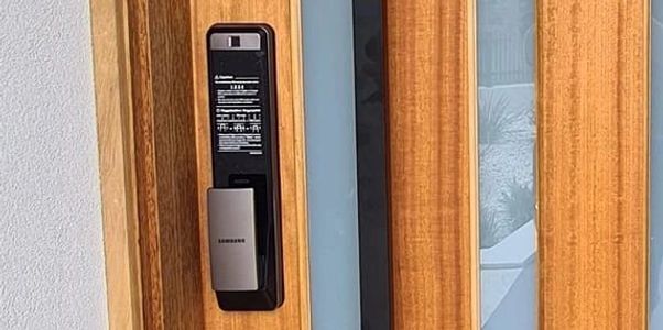 front entrance door with a samsung smart lock installed