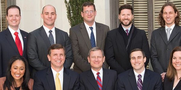 Jacob Rush at the Supreme court with Chief Justice Roberts.