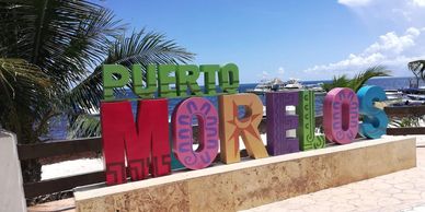 Puerto Morelos, Mexico, is a quiet beach town known for its pristine beaches and coral reefs.