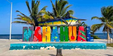 Mahahual, Mexico, is a peaceful beach town known for its clear waters and vibrant marine life.