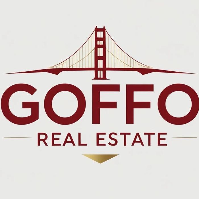 Stack of books next to pencils in a holder and a camera.