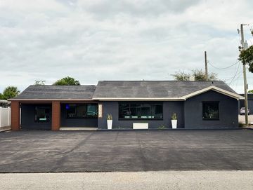 Exterior photo of 390 Poinciana Dr. commercial property.