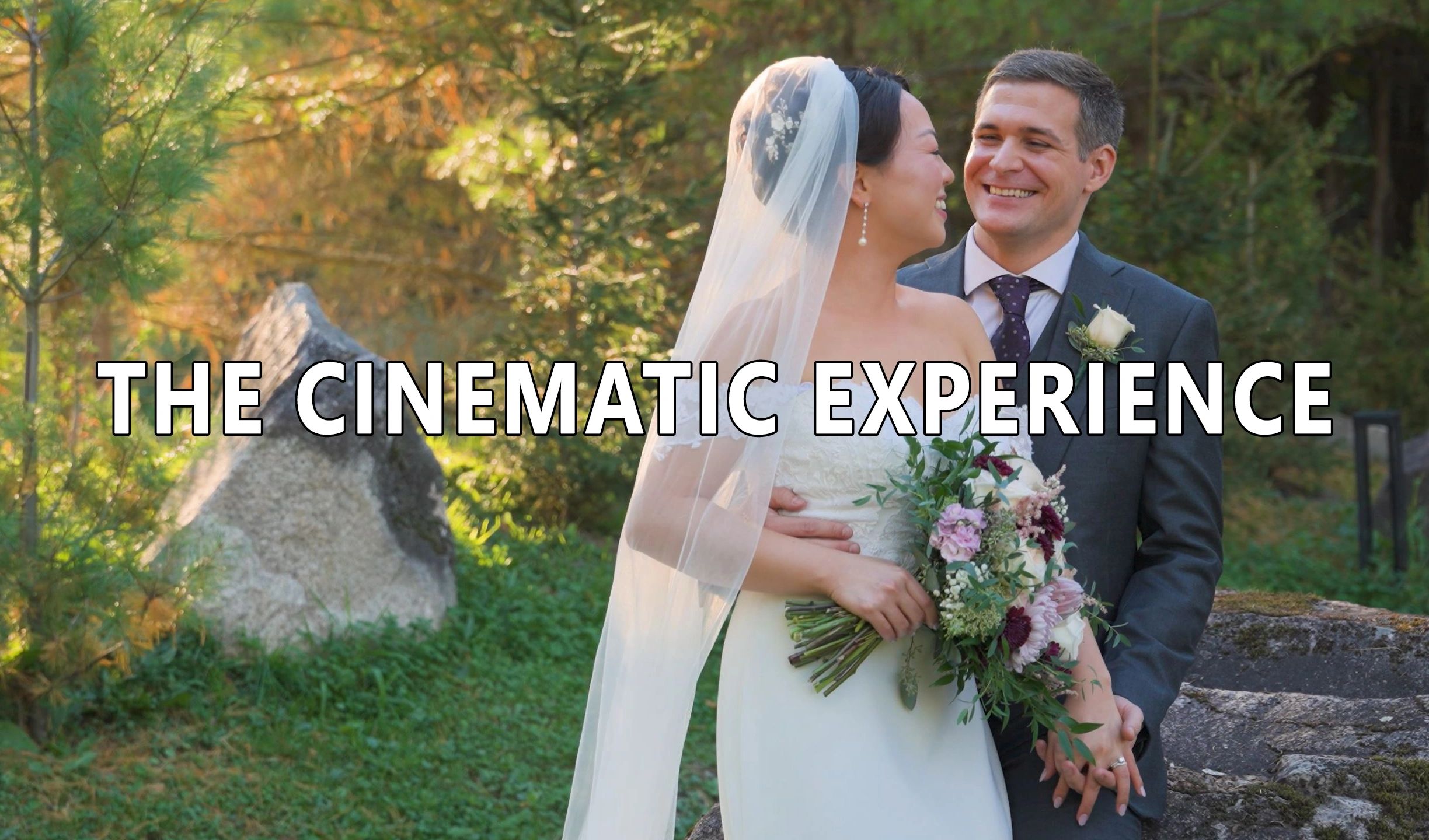 A happy couple on their wedding day outdoors.