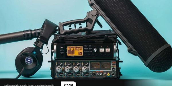 Professional audio recording equipment with headphones and boom mic.