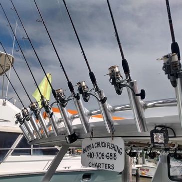 Great fishing Rock Hall fishing charters Fishing rods lined up on a charter boat .