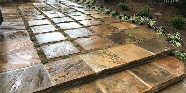 Residential stonework landscaping client custom plants stone