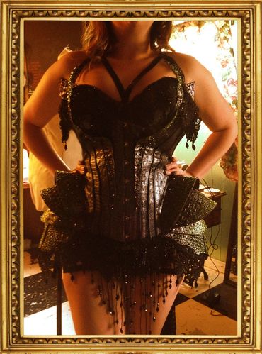 Jormungandr in embossed, hand dyed leather with rhinestone, bead and lace details