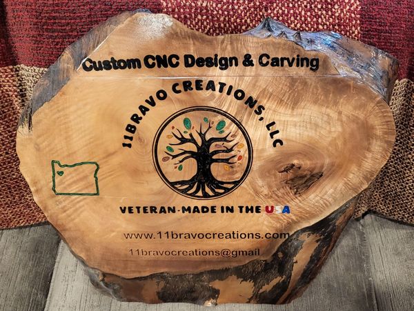 Our own logo carved and epoxied in a maple cookie.